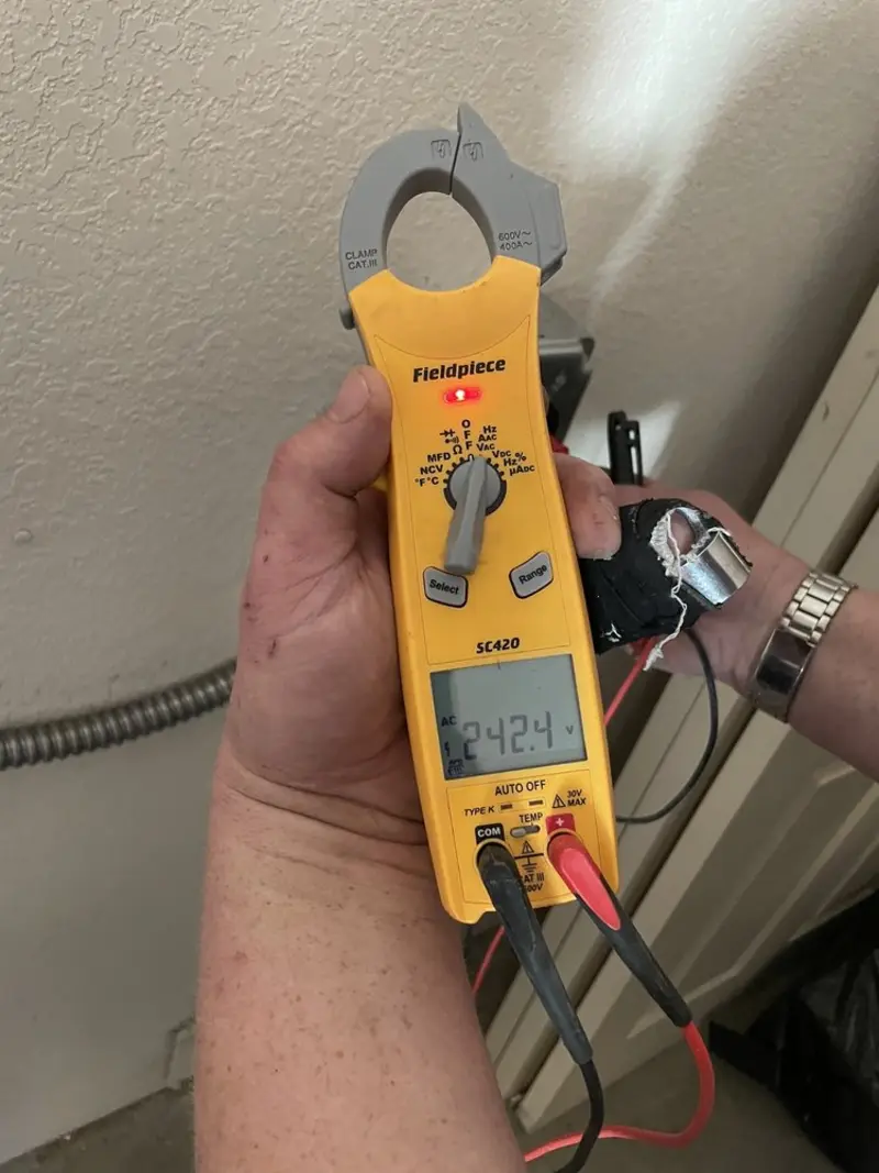 Voltage testing with clamp meter during Generator Installation in Trinidad